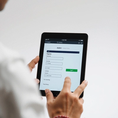 User submitting online form on tablet